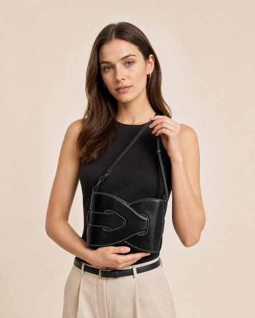 Black Aria Woven Geometric Shoulder Bag model view with adjustable shoulder strap - Ravzelo