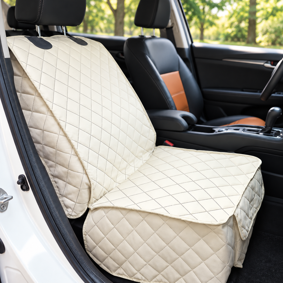 Ivory quilted pet car seat cover installed over a front seat and seat base inside a vehicle - Ravzelo