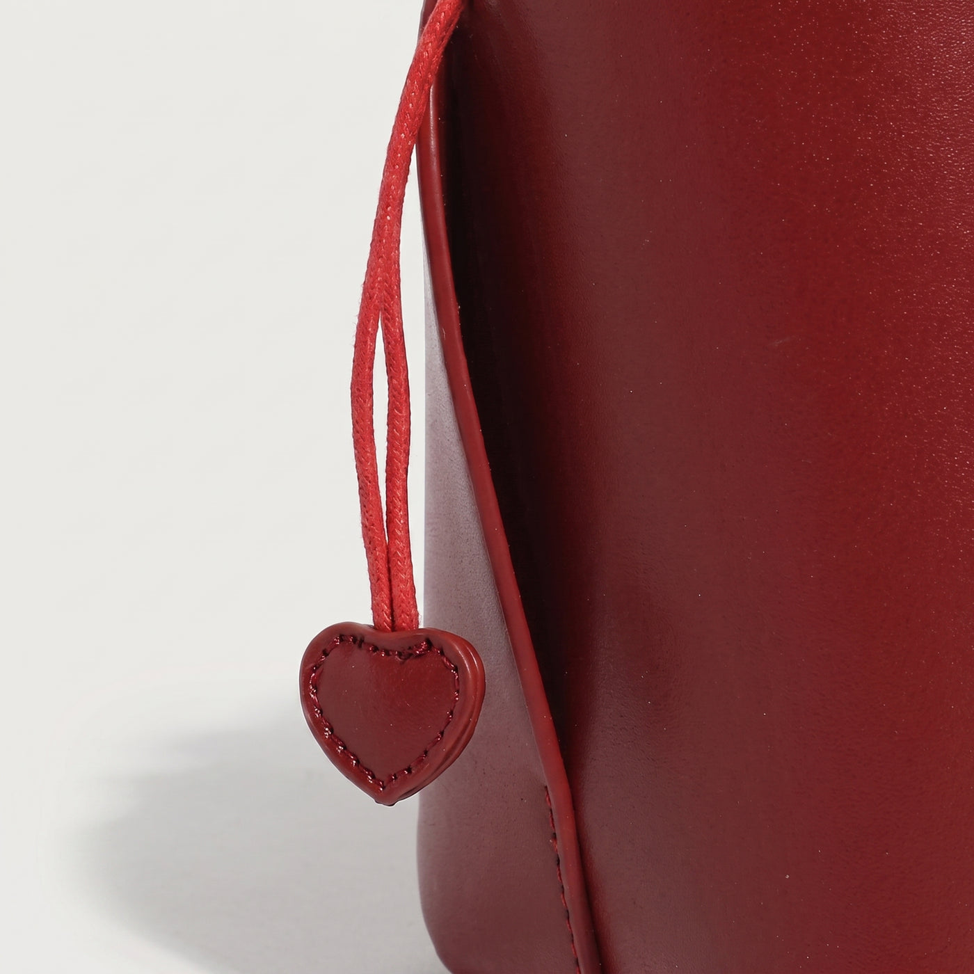 Petal Vegan Leather Bucket Crossbody Bag